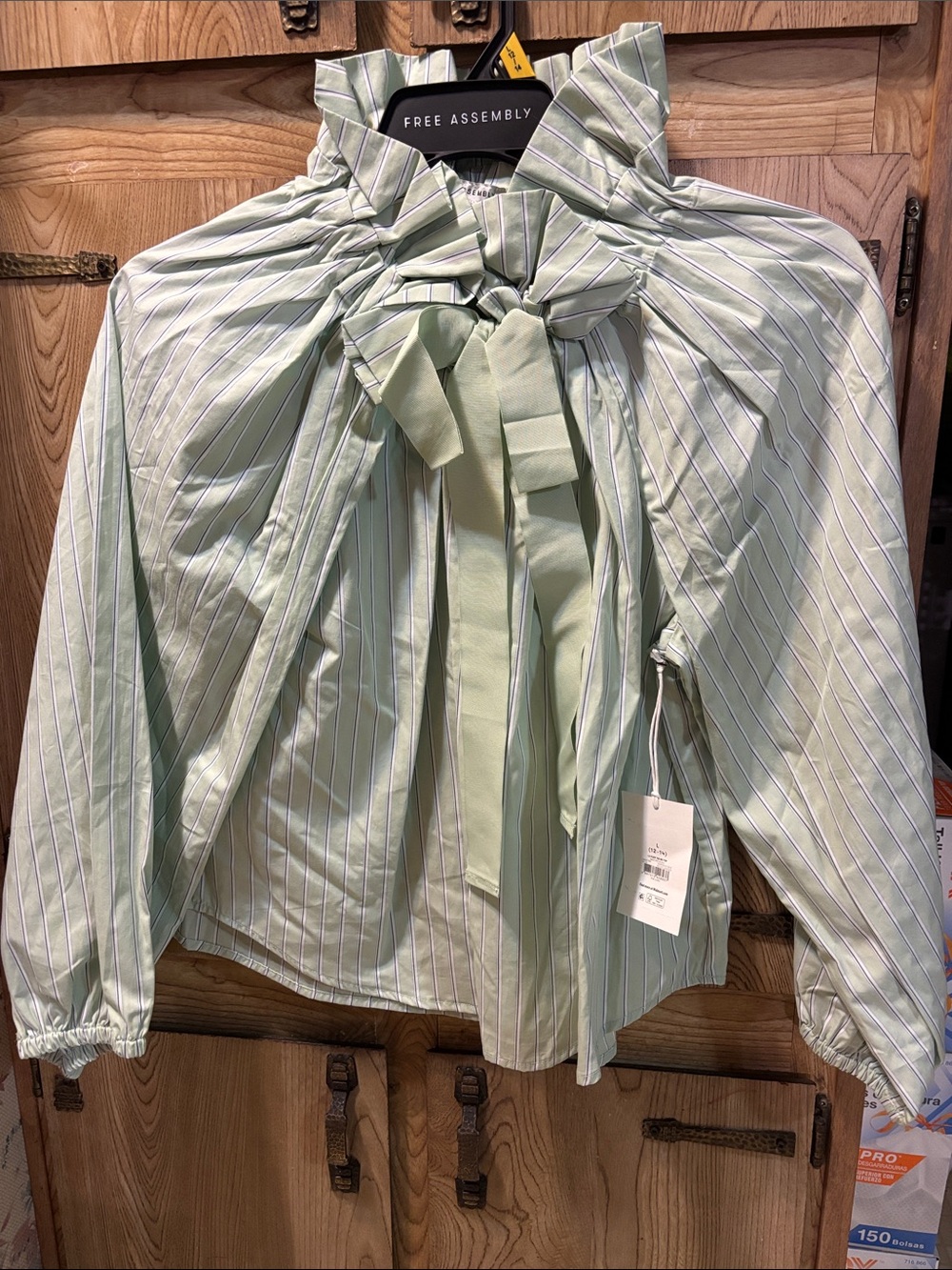 Mint green ruffled blouse size L 12/14